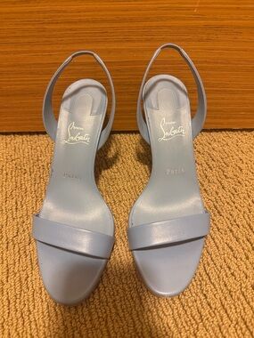 Christian Louboutin Women's Light Blue Slingback Sandals in stores now!